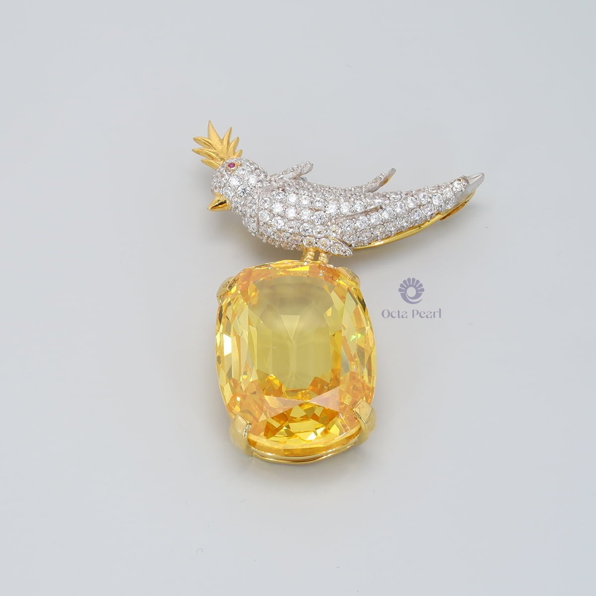 white gold Bird On A Rock Brooch With Cushion CZ Stone