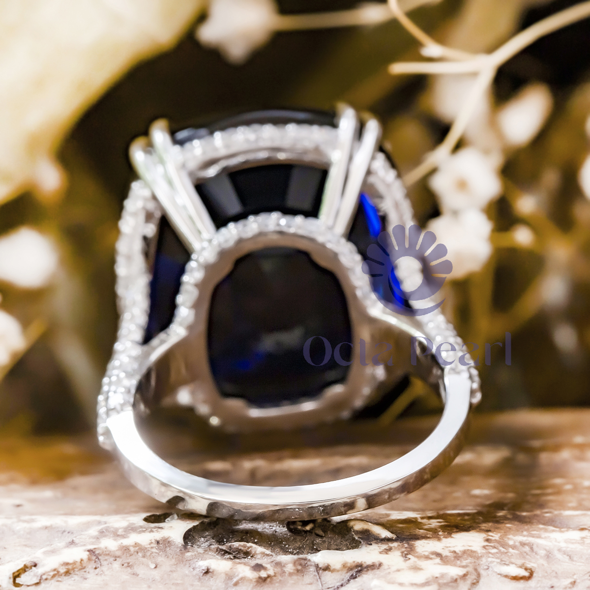 Blue Cushion Stone Hidden Halo Engagement Ring