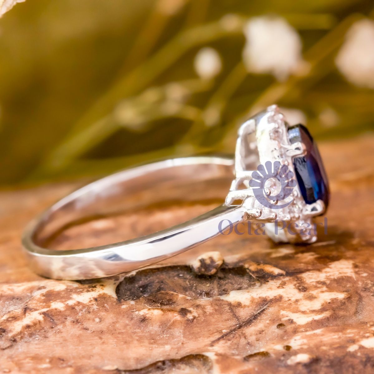 Blue Oval CZ Seven Stone Halo Engagement Ring